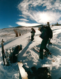 Elizabeth analyzing snow stability in back country